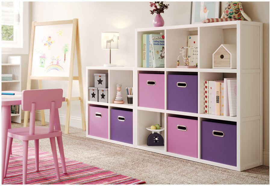 multiple white cube organizers used in kids playroom